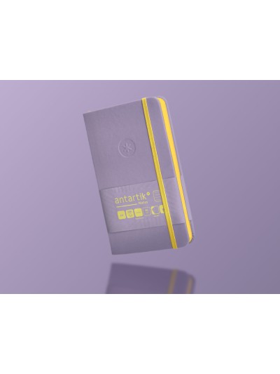 Cuaderno con gomilla antartik notes tapa dura a6 hojas rayas morado y amarillo 100 hojas 80 gr fsc