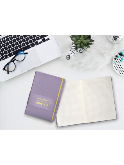 Cuaderno con gomilla antartik notes tapa dura a5 hojas cuadricula morado y amarillo 100 hojas 80 gr fsc