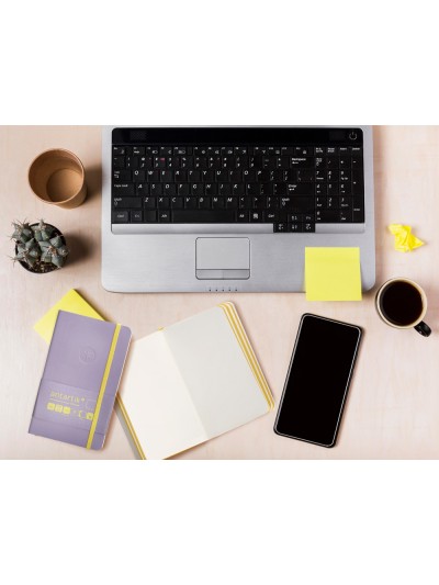 Cuaderno con gomilla antartik notes tapa blanda a6 hojas lisas morado y amarillo 100 hojas 80 gr fsc