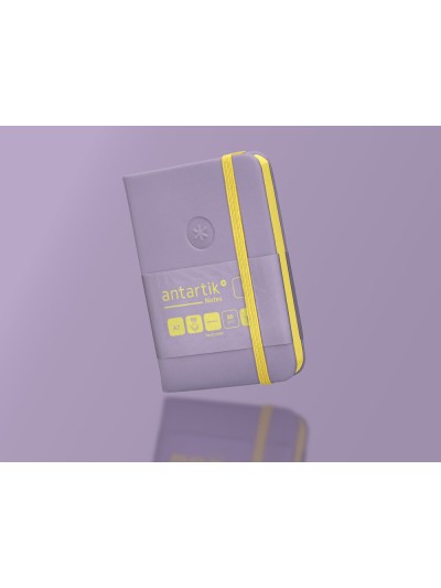 Cuaderno con gomilla antartik notes tapa dura a7 hojas lisas morado y amarillo 80 hojas 80 gr fsc