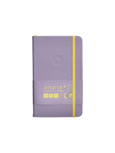 Cuaderno con gomilla antartik notes tapa dura a6 hojas cuadricula morado y amarillo 100 hojas 80 gr fsc